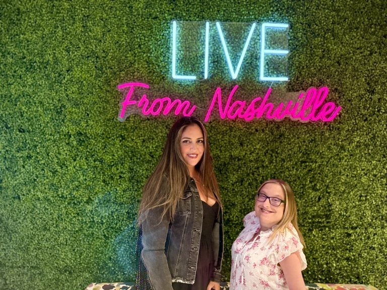 Shawna and LaLa in front of the Holston House hotel Live from Nashville sign.